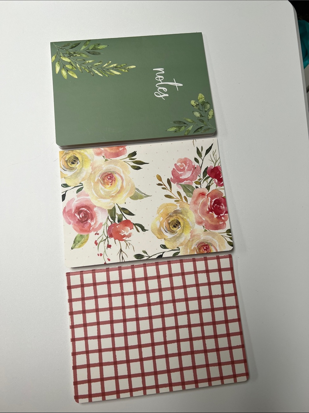 3 small notebooks